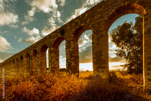 A Roman aqueduct at sunrise in Kibbutz Lohamei Haghetaot photo