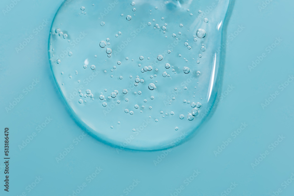 Close up macro Aloe vera gel cosmetic texture blue background with bubbles. Lemongrass gel skincare product. antibacterial liquid with aloe vera, moisturizing. Safe and environmental friendly. - obrazy, fototapety, plakaty 