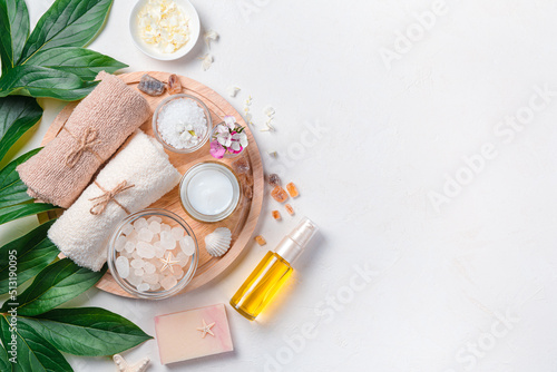 A set with organic body care cosmetics on a light background. Horizontal view, copy space.