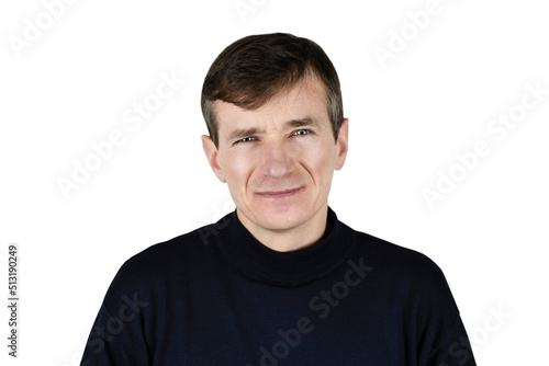 Portrait of a mature man on a white background, the man has a strict sad look, he seems to suspect someone, distrust. The man has a headache, tired look © Мар'ян Філь