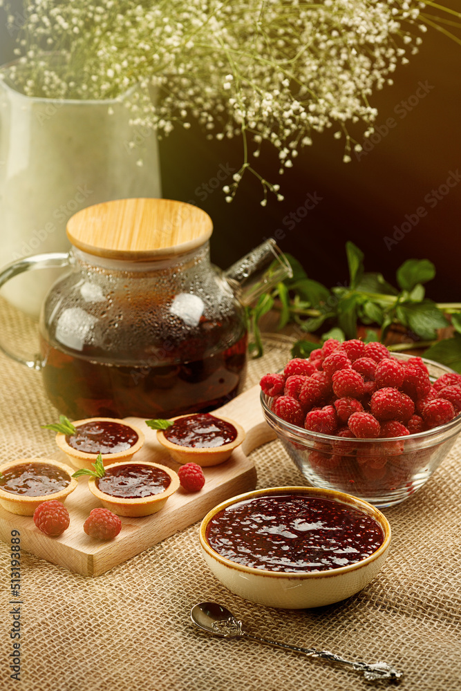 Morning table Breakfast Tea, raspberry jam, fresh berries Morning table Breakfast Tea, raspberry jam, fresh berries