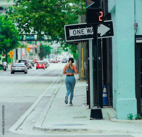 person walking in the city running sport morning Brickell miami 