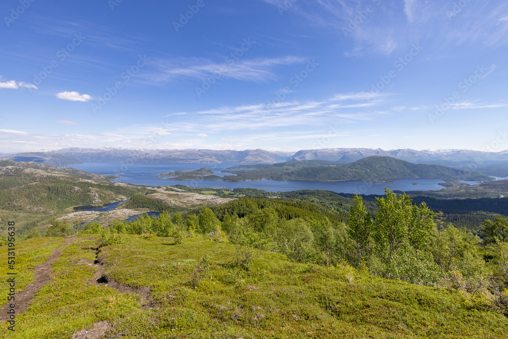 Hiking to the mountains Seterfjellet a warm and beautiful summer day, Northern Norway- Europe	