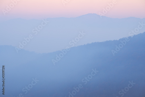 Soft pink and blue hues in an Appalachian mountain scene