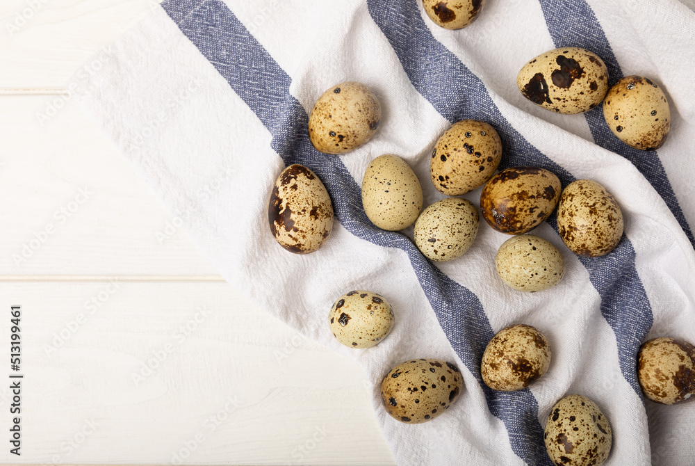 Quail eggs on a white texture background. Natural products. Place for text. Fresh quail eggs. Quail eggs on a white texture background. Natural products. Place for text. Fresh quail eggs.