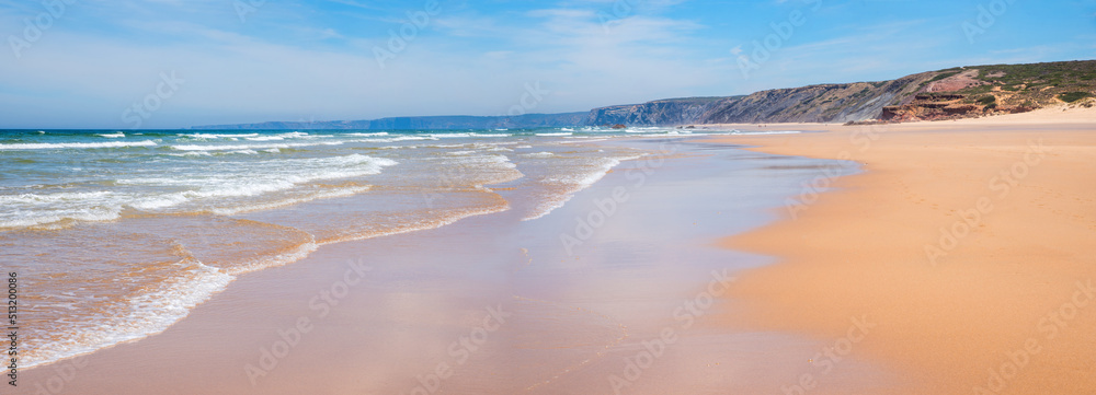 Sandy Bordeira beach with wavy ocean, idyllic place for surfing, Portugal coastal landscape - obrazy, fototapety, plakaty 