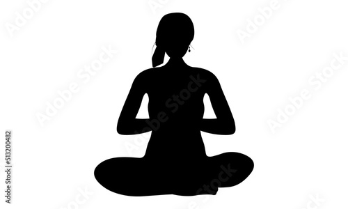 silhouette of a girl in a bandana doing lotus pose yoga