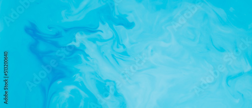 Fluid Art liquid backdrop. Blue turquoise background. Abstract background of blue-turquoise shades on liquid
