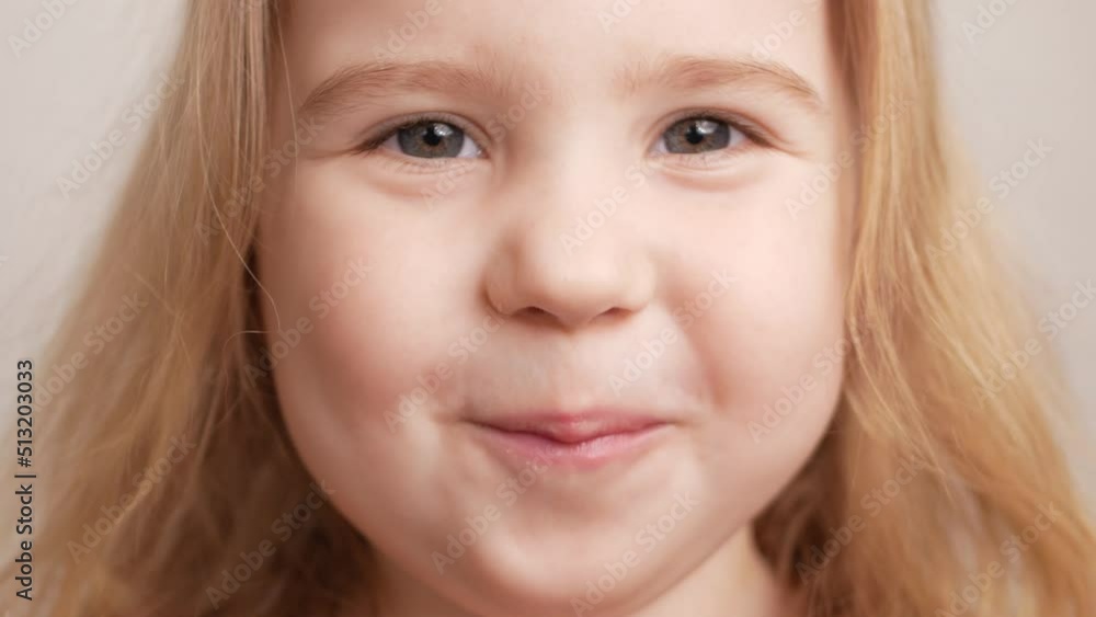 person smiles, shows teeth, yellow plaque, crooked teeth, malocclusion. child indulges person smiles, shows teeth, yellow plaque, crooked teeth, malocclusion. child indulges