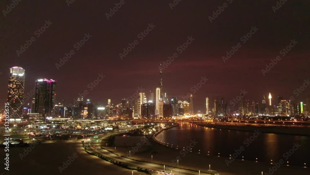 Aerial panoramic view of Burj Khalifa building skyscraper and Dubai skyline at night Aerial panoramic view of Burj Khalifa building skyscraper and Dubai skyline at night