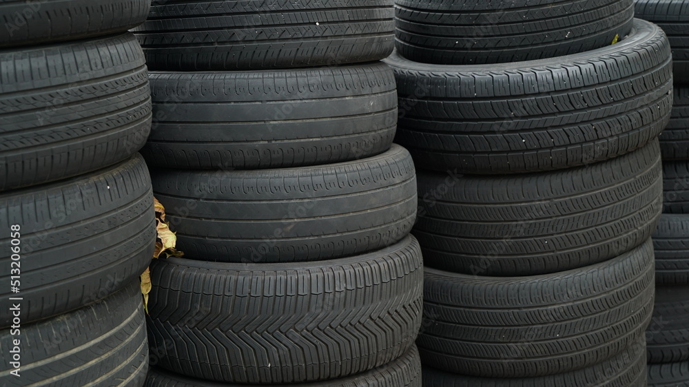 Several rubber tires are stacked Several rubber tires are stacked