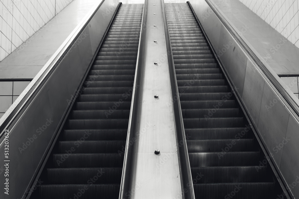 escalator in black and white shot escalator in black and white shot