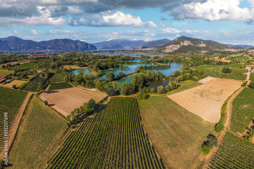 Panoramic aerial view of Franciacorta countryside in summer season, Brescia province in Lombardy district, Italy. photo