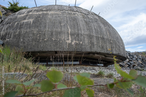 Arendal, Norway - May 28, 2022: Sandvikodden fort was built by the German occupation forces in 1941. The purpose was to secure the entrance to Arendal through Galtesund. Selective focus. photo