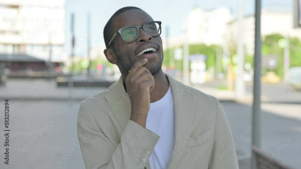 Portrait of Pensive African Man Thinking Outdoor Portrait of Pensive African Man Thinking Outdoor