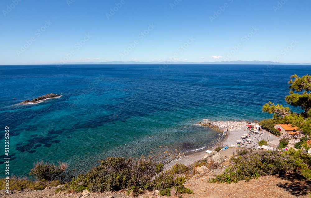 High angle view over famous Relitto beach near Pomonte perfekt for snorkeling and diving to the Elviscot shipwreck