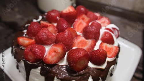 Cake with chocolate and strawberries beautiful and delicious hommade cake. photo
