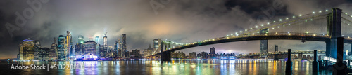 Brooklyn Bridge and Manhattan at night photo