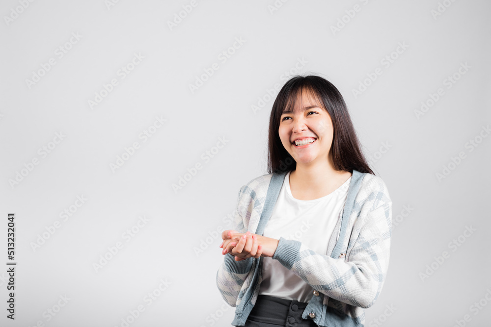 Woman winning and surprised excited screaming laughing studio shot isolated white background, Happy Asian portrait beautiful young female lifestyle cheerful smiling and laugh funny with copy space Woman winning and surprised excited screaming laughing studio shot isolated white background, Happy Asian portrait beautiful young female lifestyle cheerful smiling and laugh funny with copy space