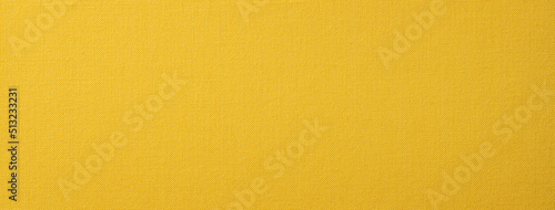 布地風の質感のある黄色い紙の背景テクスチャー
