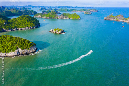 Lan Ha Bay in Cat Ba archipelago is beautiful when viewed from a drone with many different large and small islands, with many surfing motorbikes running back and forth for those who like thrilling gam