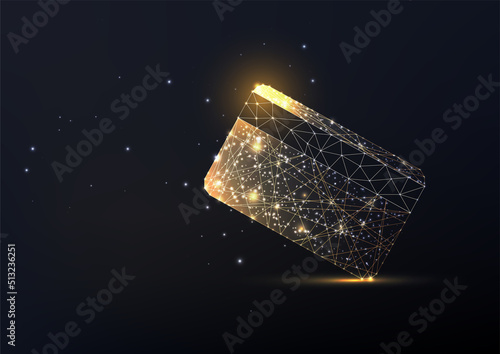 Concept of gold credit card in futuristic glowing low polygonal style on black backgound. 