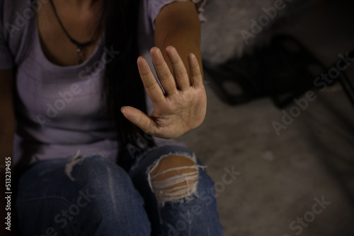 Hands of Asian women are prohibited. In gloomy tones being in denial and expressing restriction.