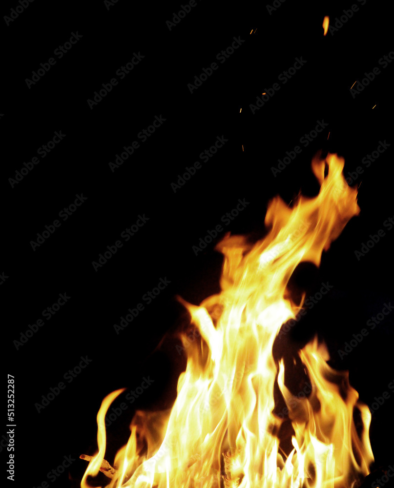 Close up burning flames on black background for graphic design or wallpaper