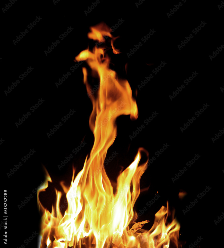 Close up burning flames on black background for graphic design or wallpaper Close up burning flames on black background for graphic design or wallpaper