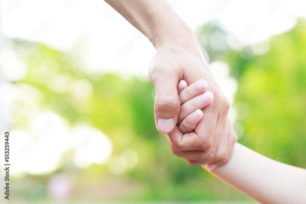 Children's hands with the warmth of mother's care Children's hands with the warmth of mother's care