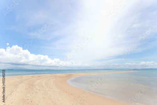 view of sea waves shore and fantastic rocky beach coast on the island and background sky with mountain, Wild nature. Tropical landscape coastline. Summertime. Travel holiday concept.