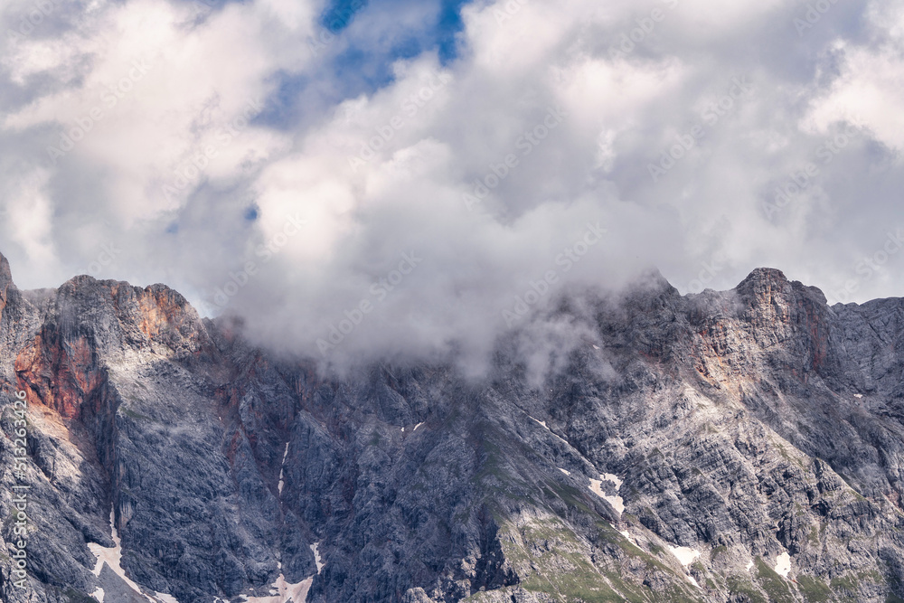 Beautiful summer landscape with dramatic clouds in the sky over impressive mountains - Hochkönig Austria