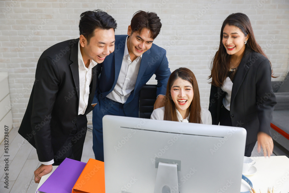 Group of young business people working together in modern office, Business colleague discussing looking and doing video conference on computer Group of young business people working together in modern office, Business colleague discussing looking and doing video conference on computer