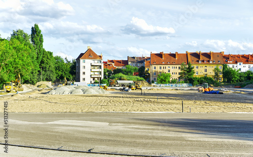 Construction of a new sports center with a pitch and running track photo