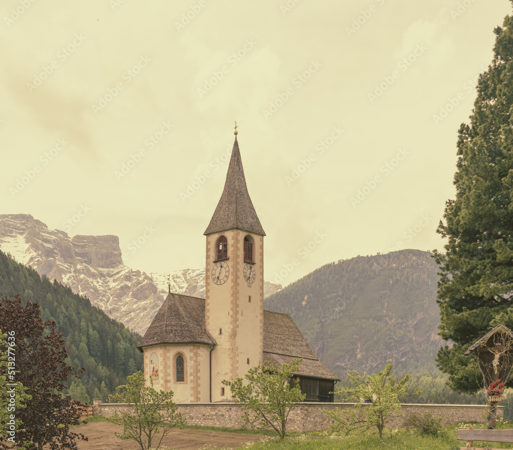 scenic view of old church and mountain landscape