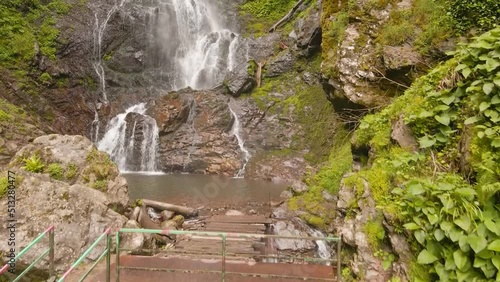 Drone shot of the waterfall Merisi. Batumi. Georgia. Camera track-in. photo