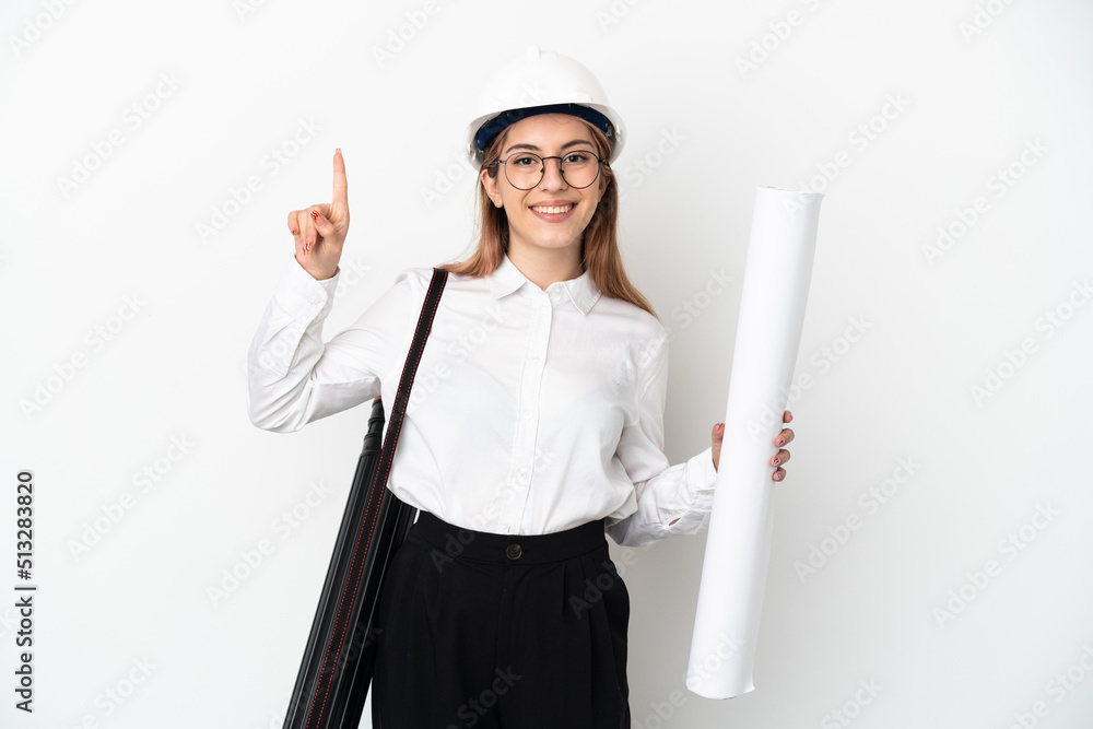 Young architect woman with helmet and holding blueprints isolated on white background pointing up a great idea Young architect woman with helmet and holding blueprints isolated on white background pointing up a great idea