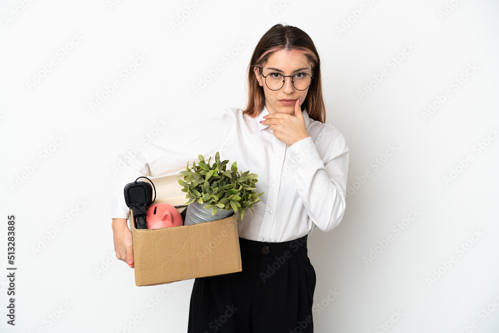 Young caucasian woman moving in new home among boxes isolated on white background thinking Young caucasian woman moving in new home among boxes isolated on white background thinking