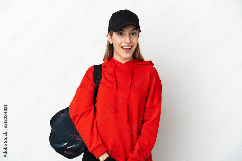 Young sport woman with sport bag isolated on white background with surprise facial expression Young sport woman with sport bag isolated on white background with surprise facial expression