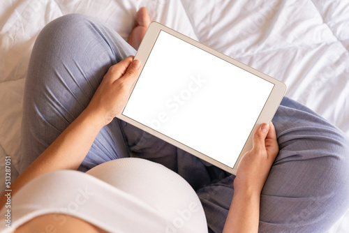 Pregnancy mockup display. Pregnant woman holding smart tablet. Mobile pregnancy online maternity application mock up. Concept maternity, pregnancy, childbirth.