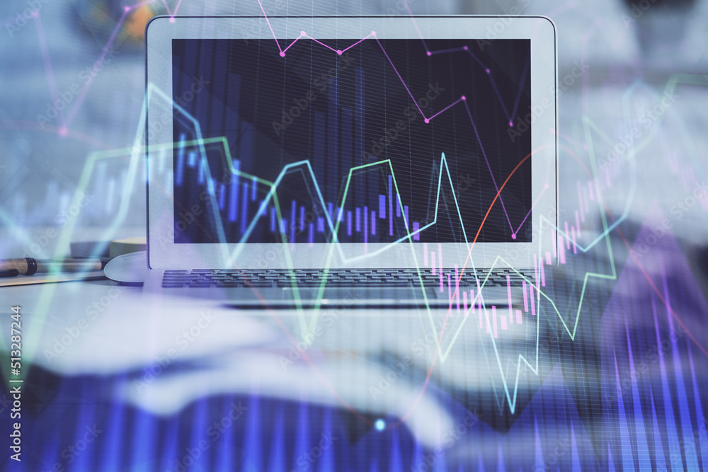 Forex market chart hologram and personal computer background. Double exposure. Concept of investment. Forex market chart hologram and personal computer background. Double exposure. Concept of investment.
