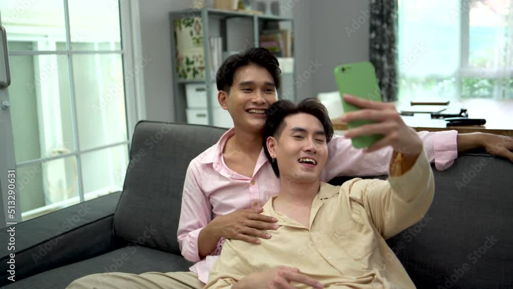 Young gay couple making selfie and feeling happy. Concept of LGBT and Love. Young gay couple making selfie and feeling happy. Concept of LGBT and Love.