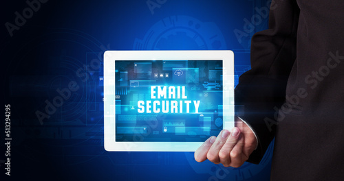 Wallpaper Mural Person holding tablet, security concept Torontodigital.ca