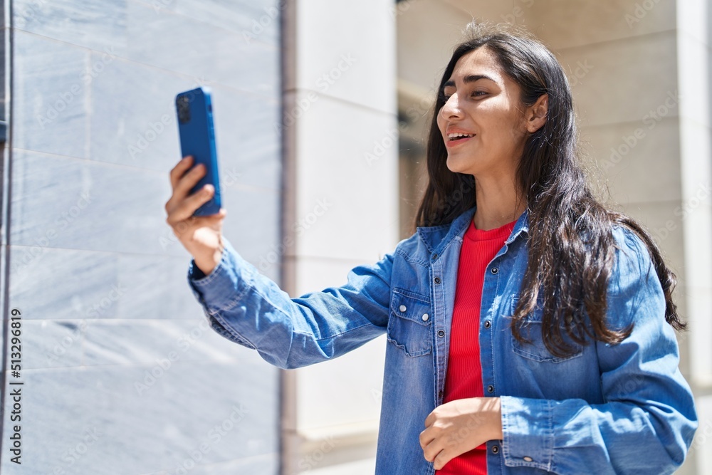 Young hispanic girl smiling confident having video call at street Young hispanic girl smiling confident having video call at street