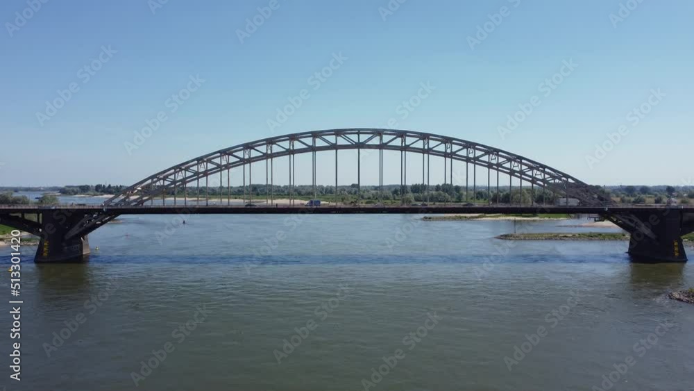 Bridge over river Waal in Nijmegen The Netherlands, called the 'Waalbrug', Aerial flying over Bridge over river Waal in Nijmegen The Netherlands, called the 'Waalbrug', Aerial flying over