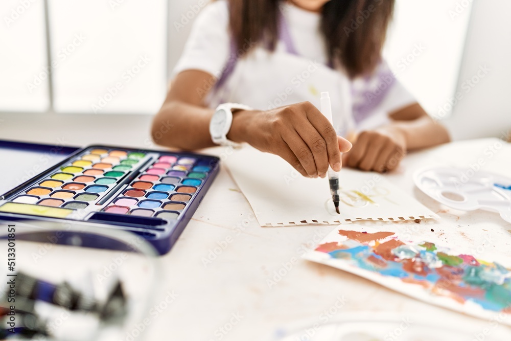 African american girl drawing at art school African american girl drawing at art school