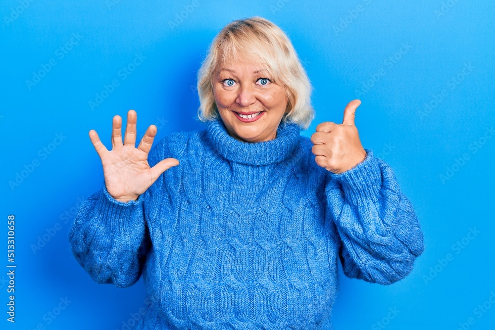 Middle age blonde woman wearing casual clothes showing and pointing up with fingers number six while smiling confident and happy. Middle age blonde woman wearing casual clothes showing and pointing up with fingers number six while smiling confident and happy.