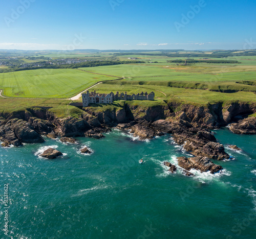 drone view of Slains Castle and the wild coast of Aberdeenshire photo