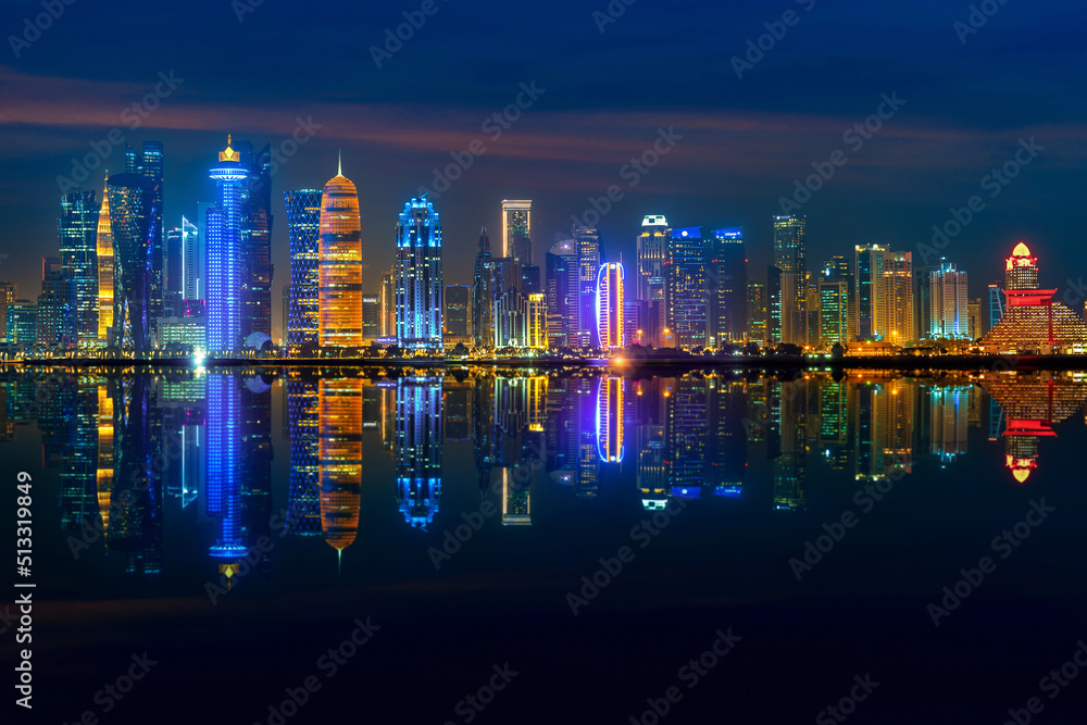 Fototapeta premium Panoramic skyline of Doha city at night, Qatar.