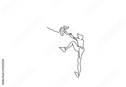 two people trying to climb hill in nature and helping each other